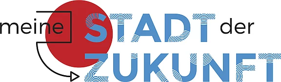 Logo mit Text: „meine STADT der ZUKUNFT“. „STADT“ groß in Blau vor rotem Kreis; „meine“ und „der“ in Schwarz. Skizzierter Pfeil und Quadrat links als Gestaltungselemente. Vermittelt das Thema einer persönlichen, zukunftsorientierten Stadt.