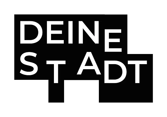 Der Schriftzug "DEINE STADT" ist in großen, weißen Buchstaben auf schwarzem Hintergrund dargestellt. Der Fokus liegt auf der persönlichen Verbindung zum eigenen Wohnort. Die Buchstaben sind modern und auffällig angeordnet.