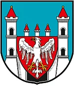 Das Stadtwappen zeigt in Blau eine silberne Burg mit zwei gezinnten, zweigeschossigen Türmen mit zwei übereinander liegenden schwarzen Toren und goldbeknauften, roten Spitzdächern; der Mittelbau mit drei Türmchen und einem schwarzen Tor, das von einem
